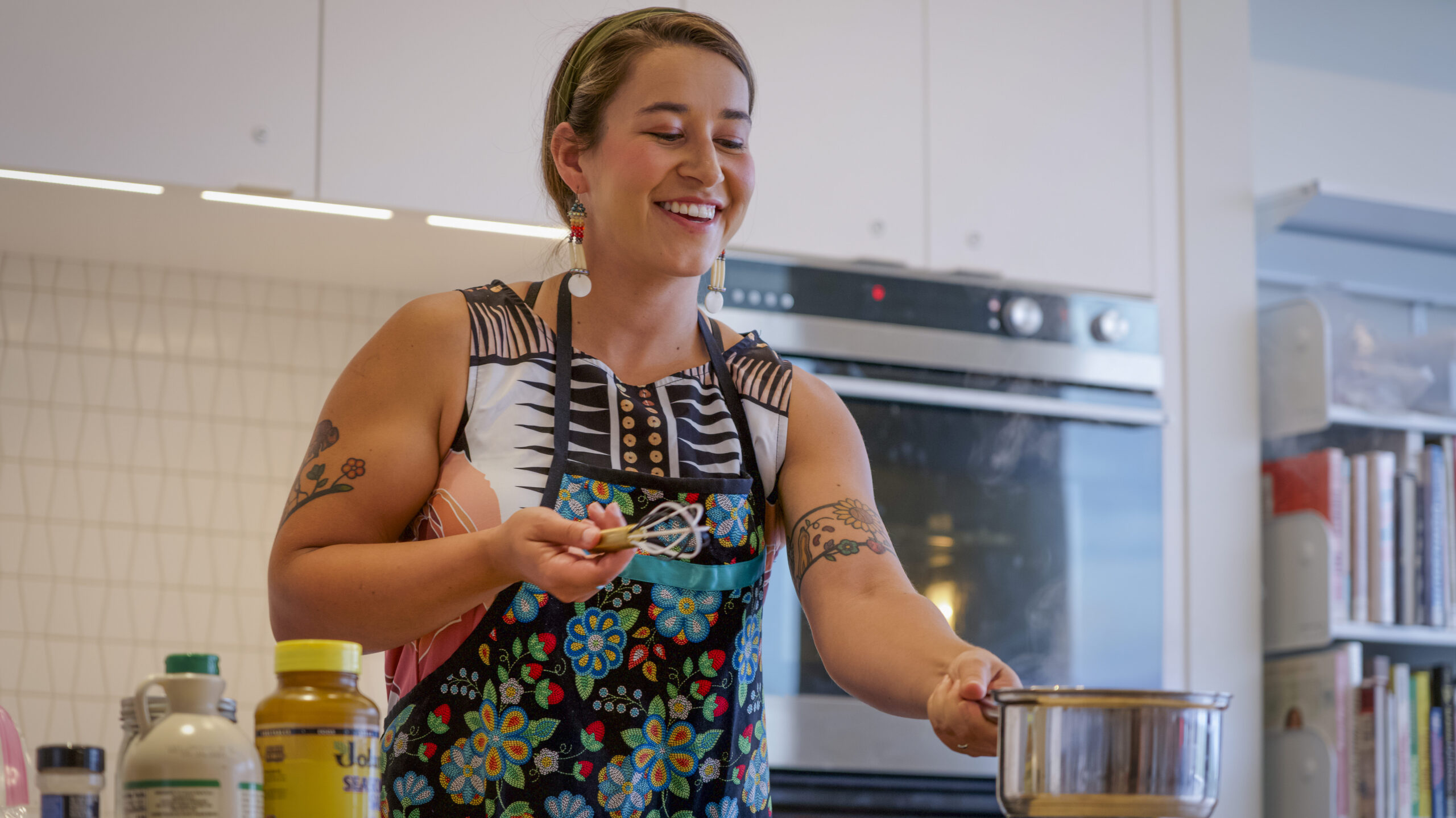 Mariah teaching a cooking class