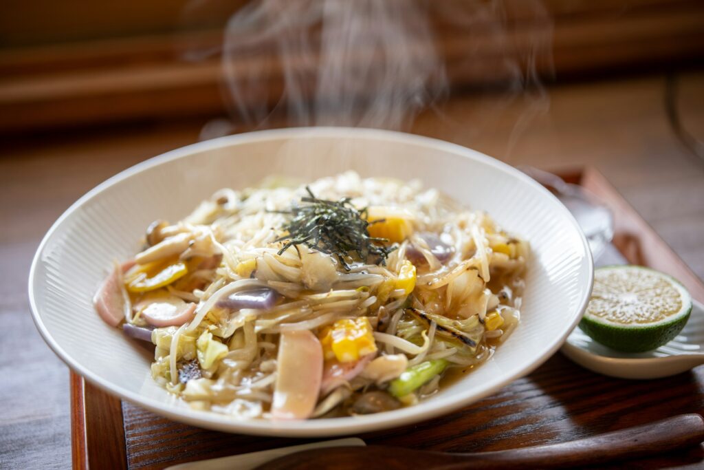 Steaming bowl of noodles