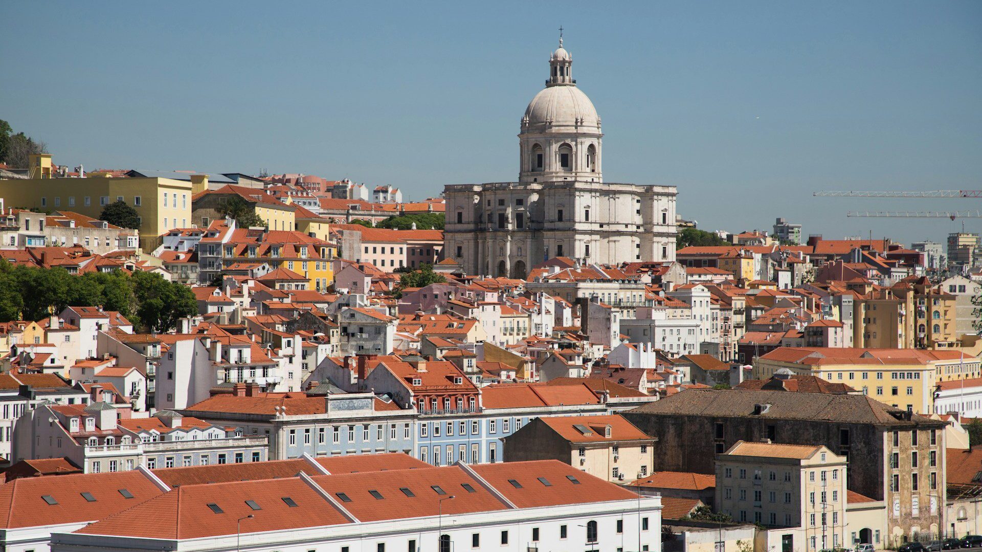 Large white church overlooking city