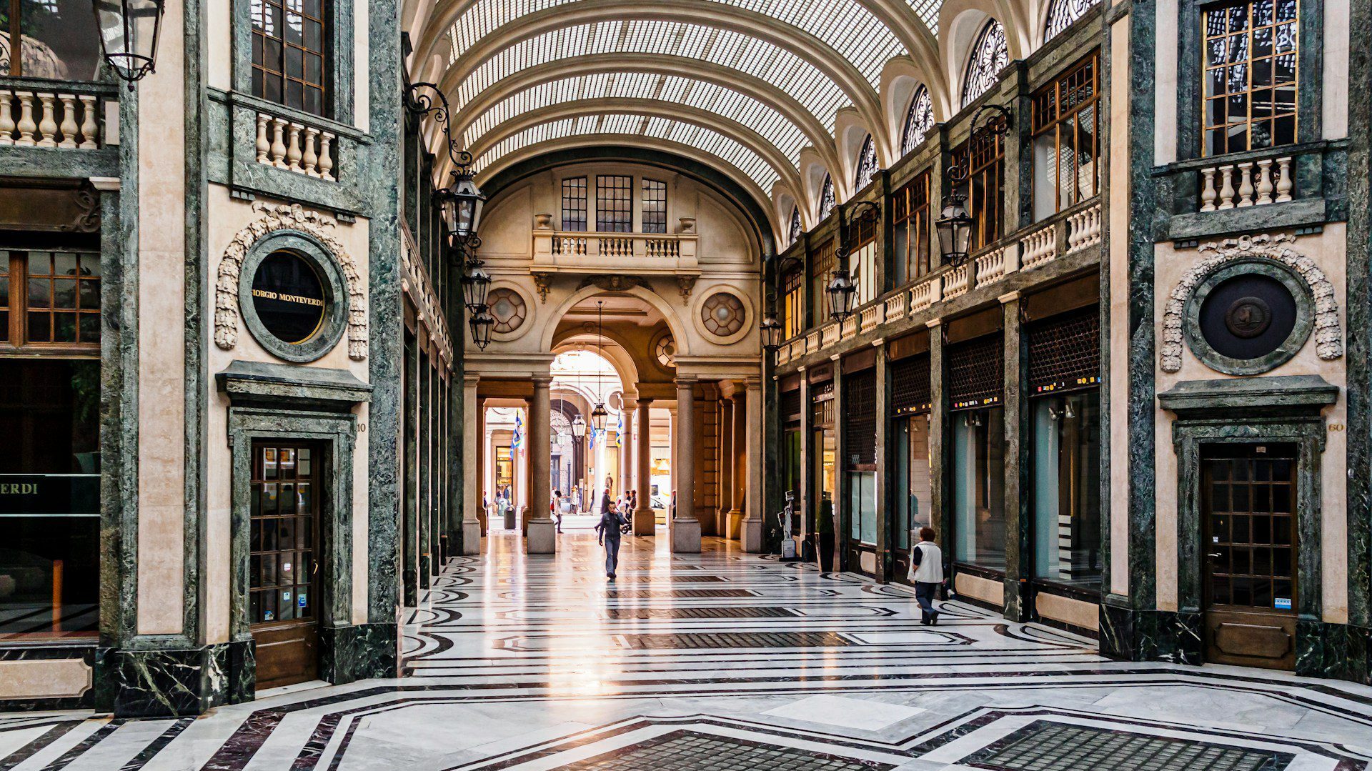 Inside an ornate shopping arcade in Turin