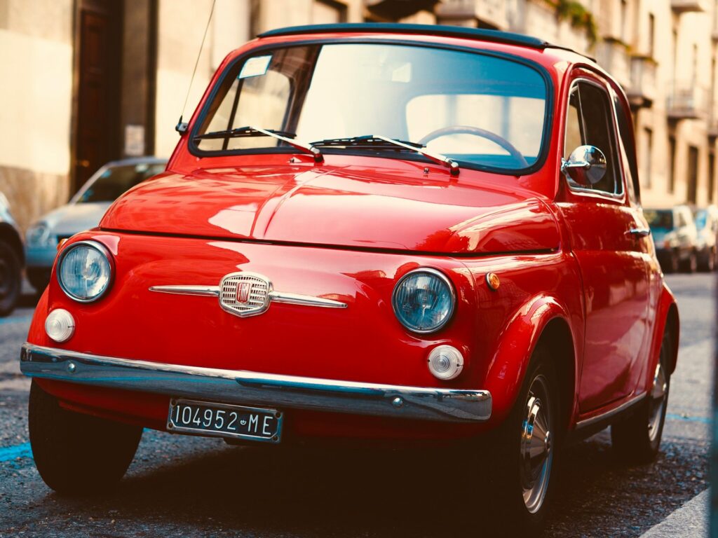 Close up of a red vintage Fiat 500 
