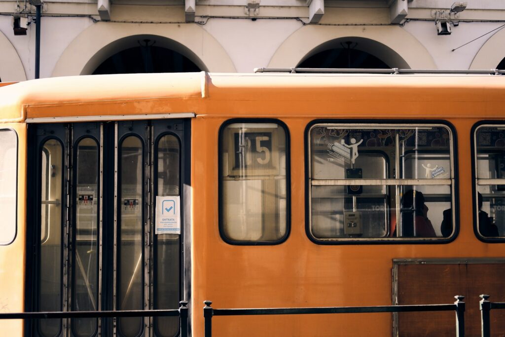 Close up an old yellow tram in Turin