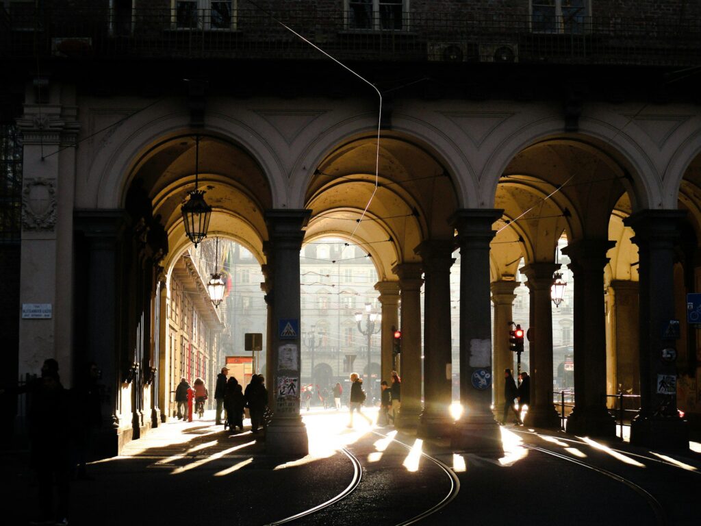 Light flooding through porticoes in Turin