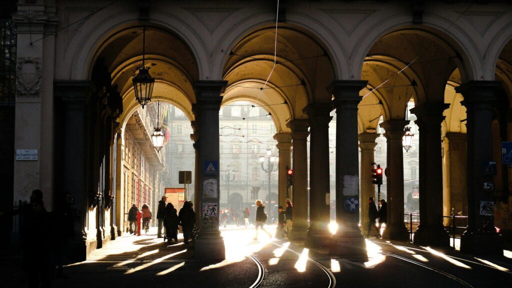 Light flooding through porticoes in Turin
