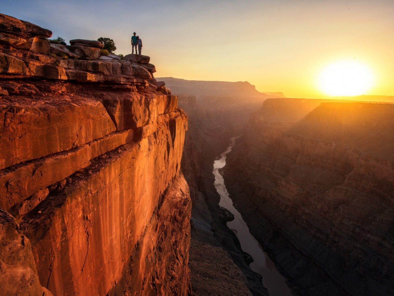 Experience the breathtaking view of the grand canyon at sunset, a must-visit destination for 2020 travelers.