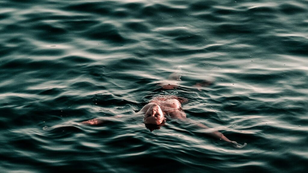Man floating in water