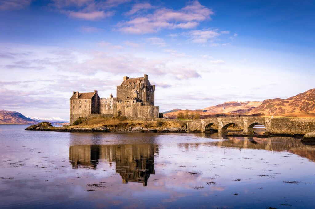 Castle overlooking water in Scotland