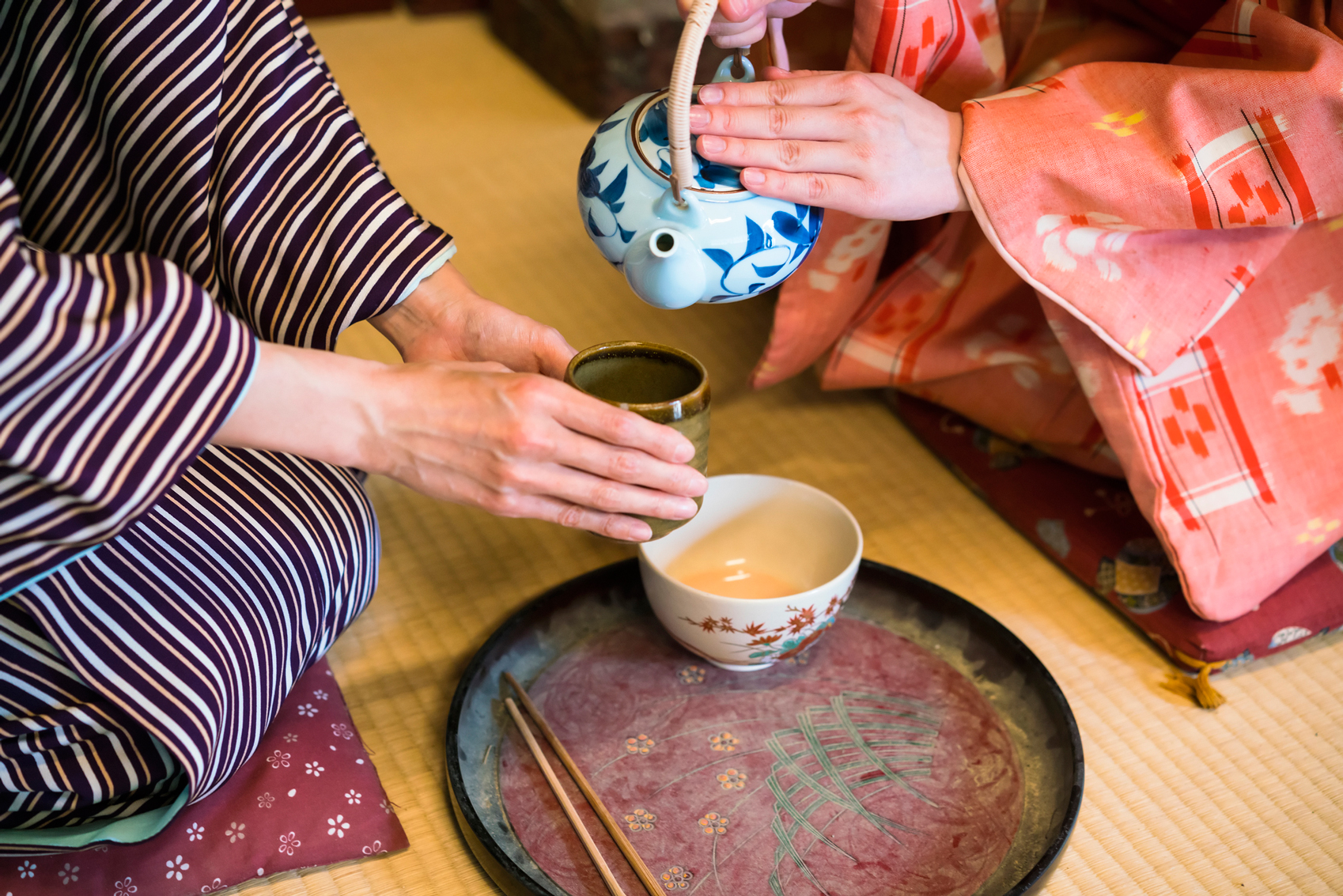spiritual japan tea-ceremony-www.istockphoto.com_gb_photo_dertail-of-having-traditional-japanese-tea-in-kyoto-japan-gm598241342-102595975-DavorLovincic