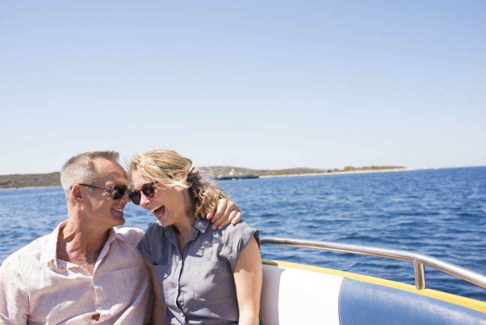 A couple on a boat trip in the Mediterranean