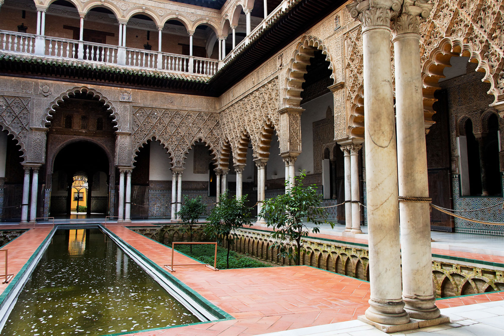Seville Landmarks Patio-de-las-Doncellas-Seville-www.istockphoto.comgbphotoseville-patio-de-las-doncellas-in-real-alcazar-gm104111498-12748036-BaroneFi