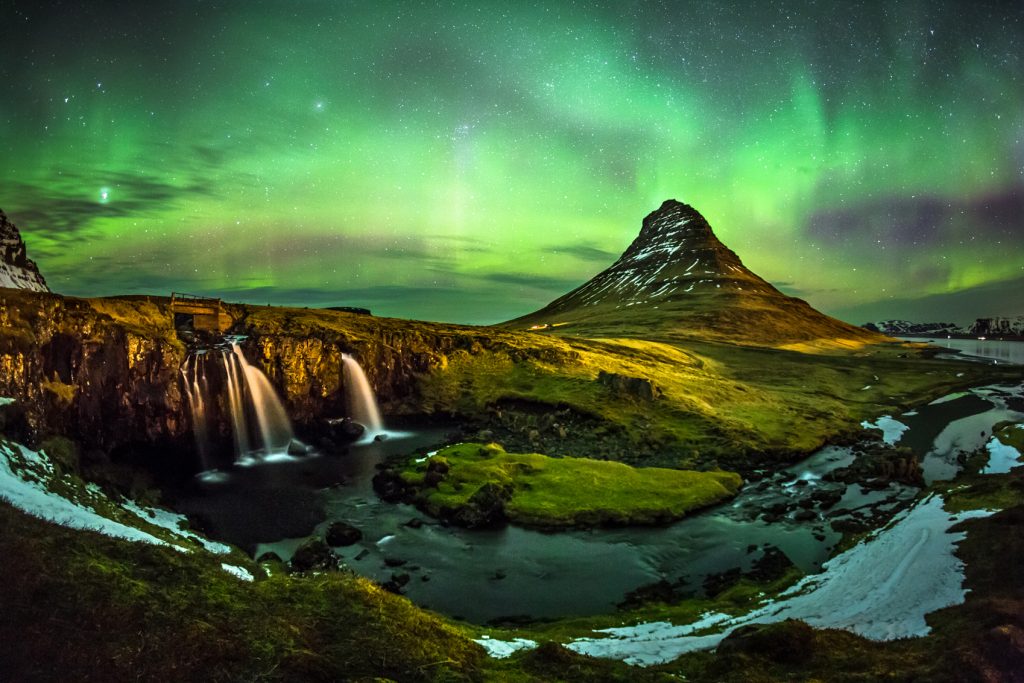 Northern Lights over a landscape in Iceland