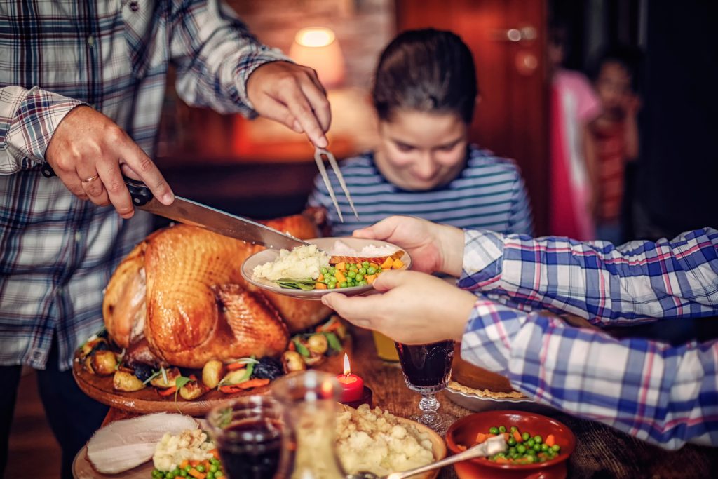 Thanksgiving facts Carving-Turkey-for-Dinner-www.istockphoto.com_gb_photo_carving-traditional-stuffed-turkey-for-dinner-gm612728662-105614039-GMVozd