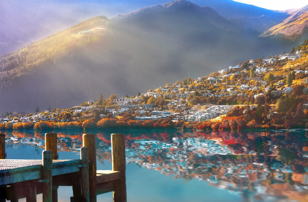sunset over lake in Queenstown, South Island, New Zealand