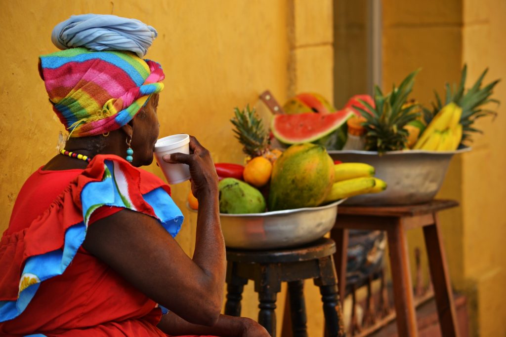 Woman drinking coffee in Cartagena Old Town