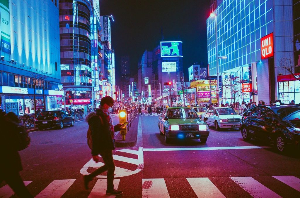 man crossing road in Japan