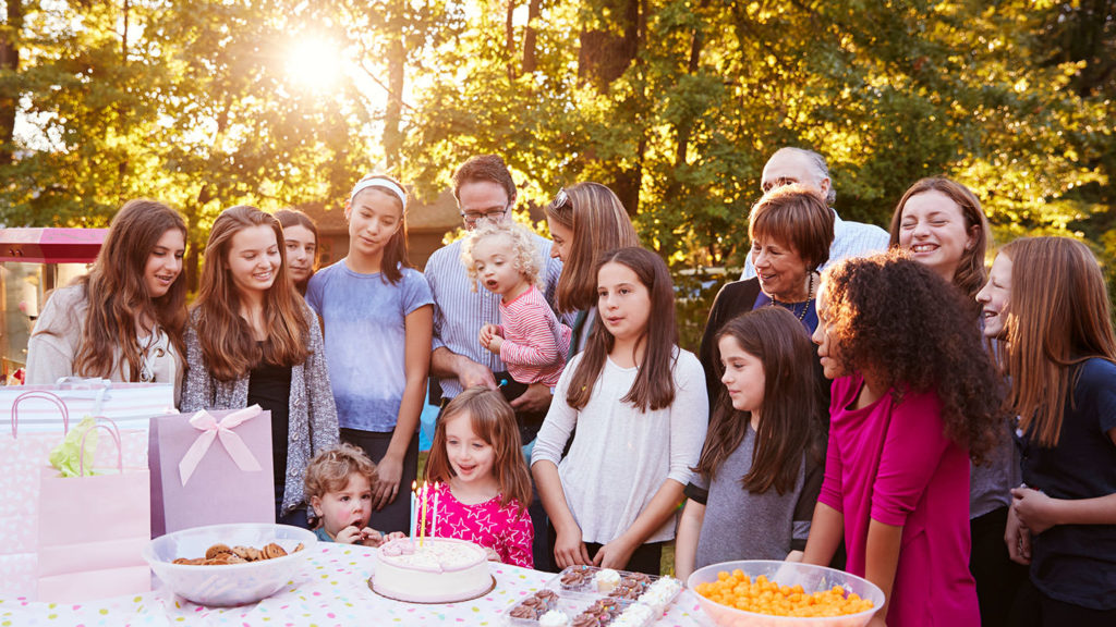 Family and friends celebrating. Reconnect with travel
