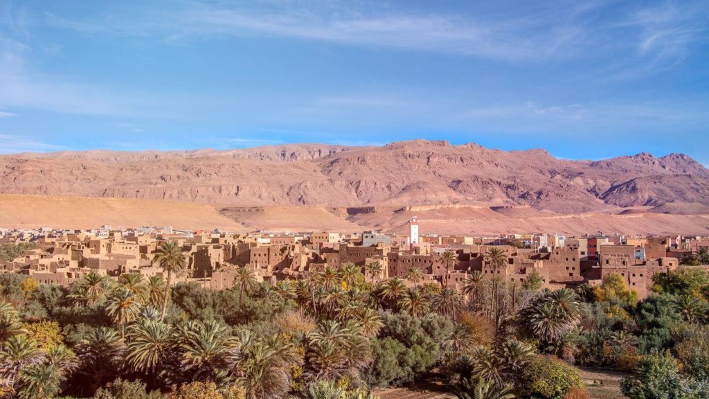 green trees brown mountains Tinghir oasis Morocco