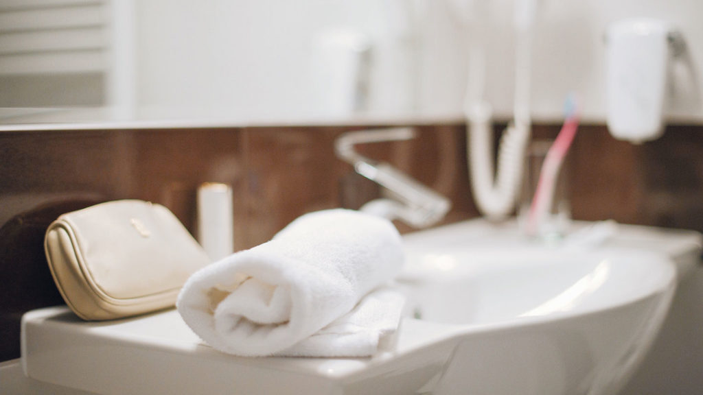 Picture of a bathroom with a face towel