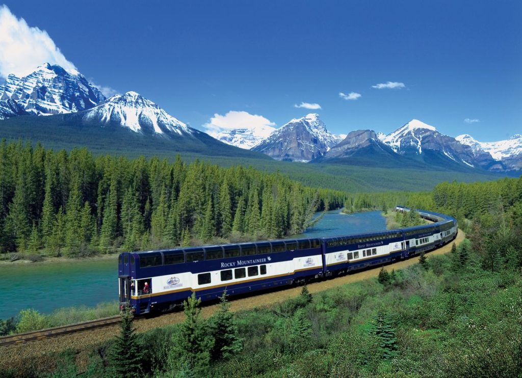 mountains forest river rocky mountaineer train