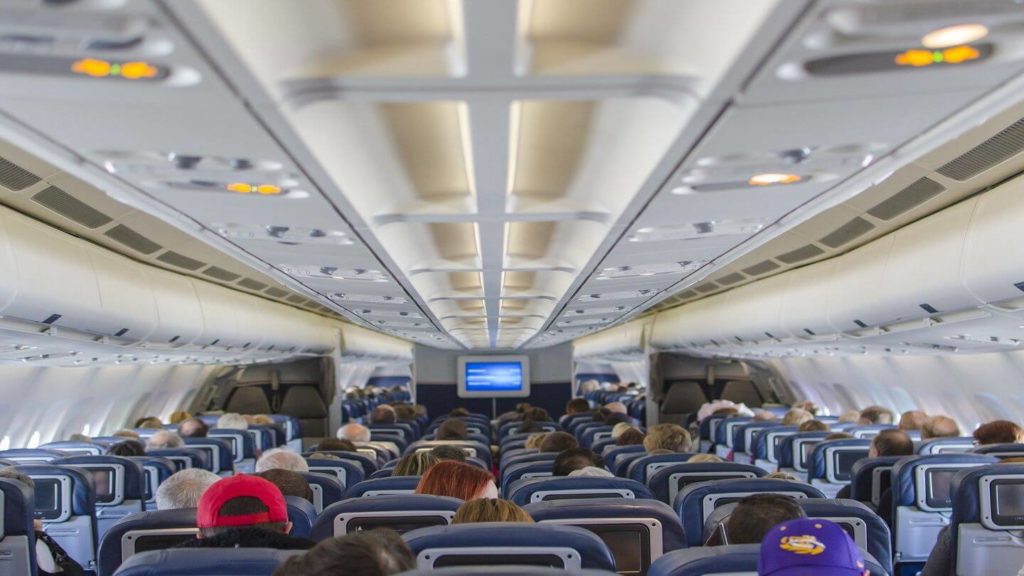aeroplane cabin and passengers