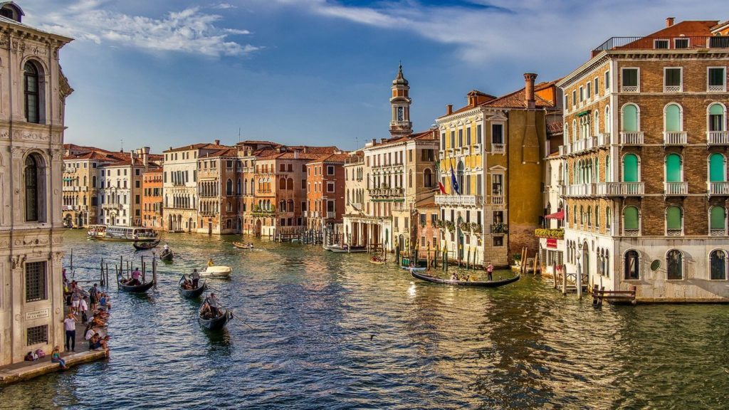 boats buildings Venice canals Italy UK air-bridge destinations