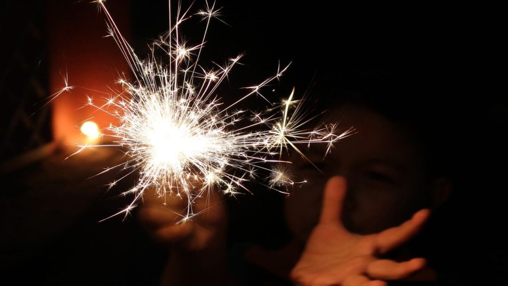 hand holding a sparkler