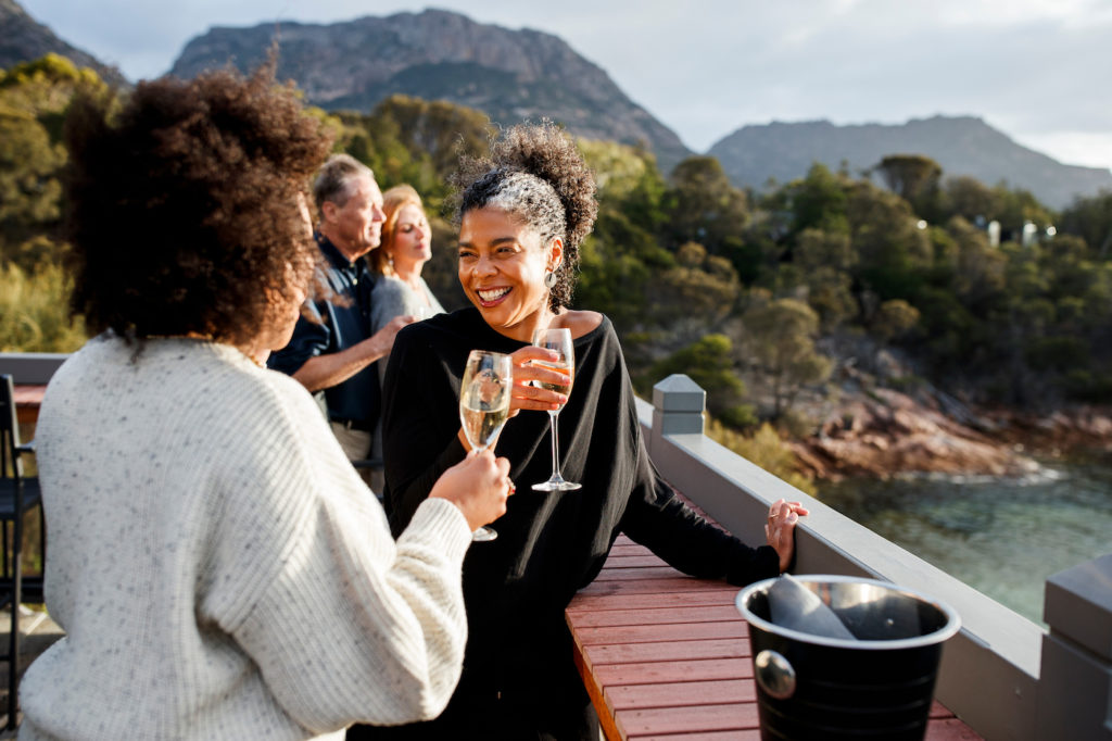 two women sipping champagne on a trafalgar private group tour