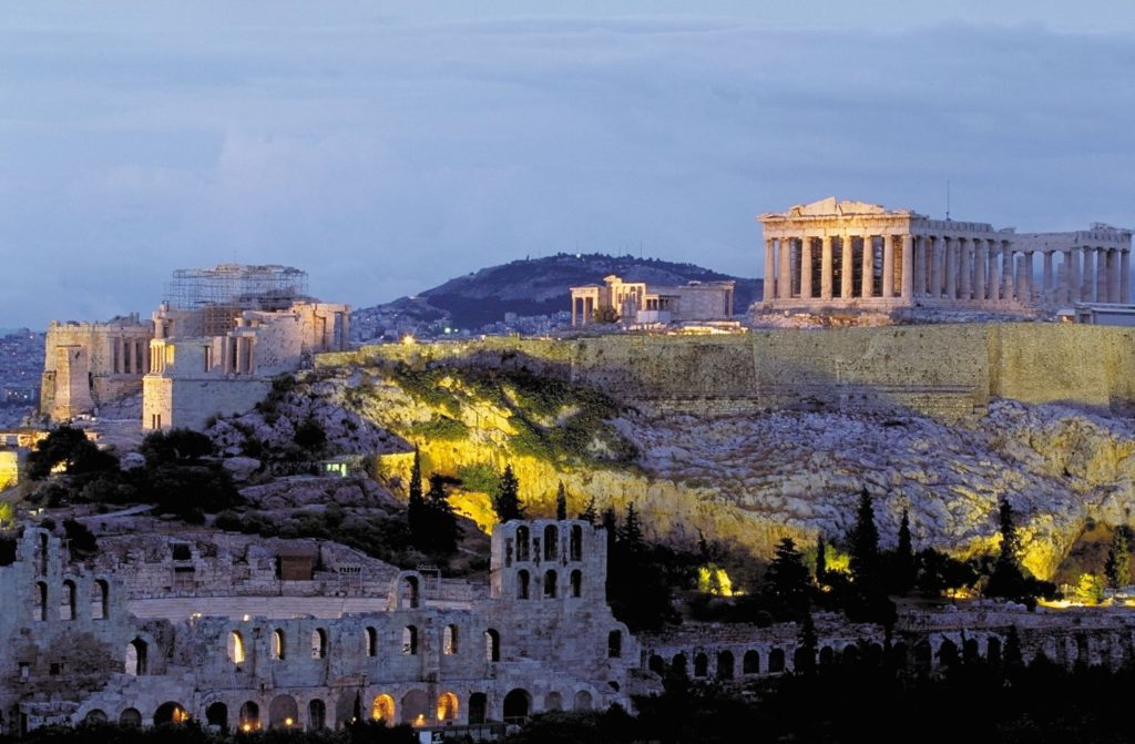 Acropolis of Athens glowing at night Greece