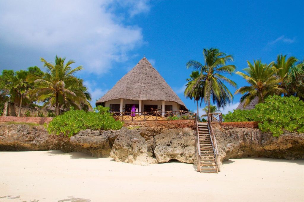 beach hut palm trees Zanzibar