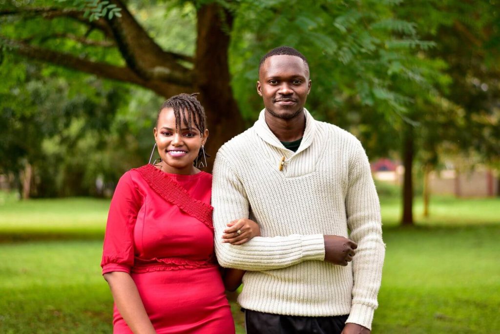 African couple linking arms
