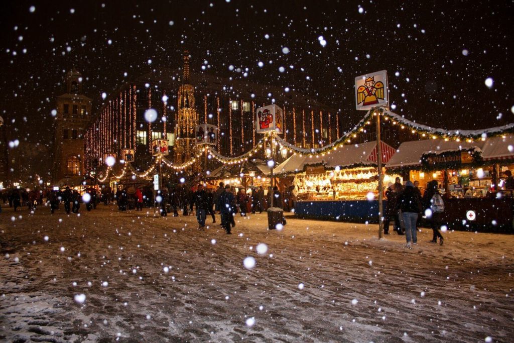 Snow falling Nuremberg Christmas markets Germany