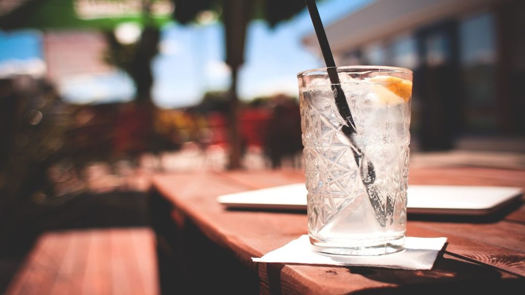 straw in glass at a bar