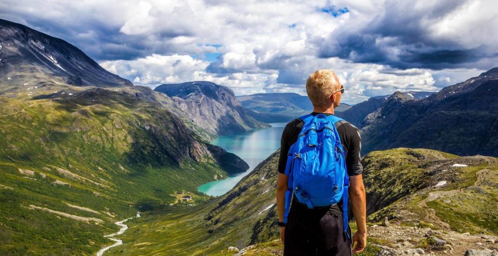 man hiking in Scandinavian mountains