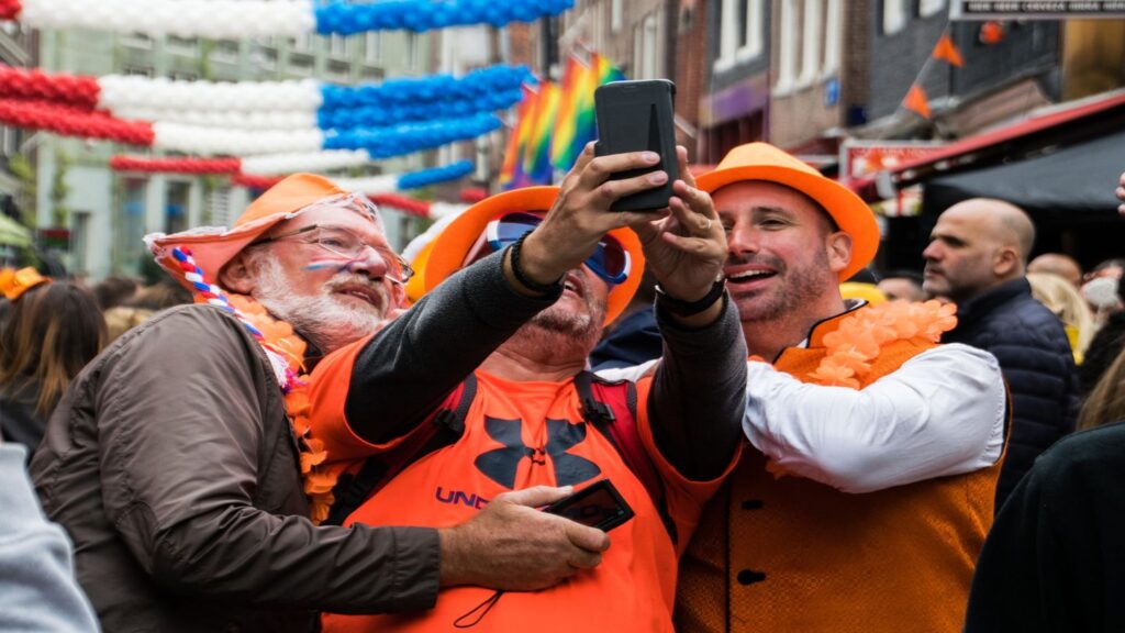 people wearing orange celebrating King's Day in the Netherlands