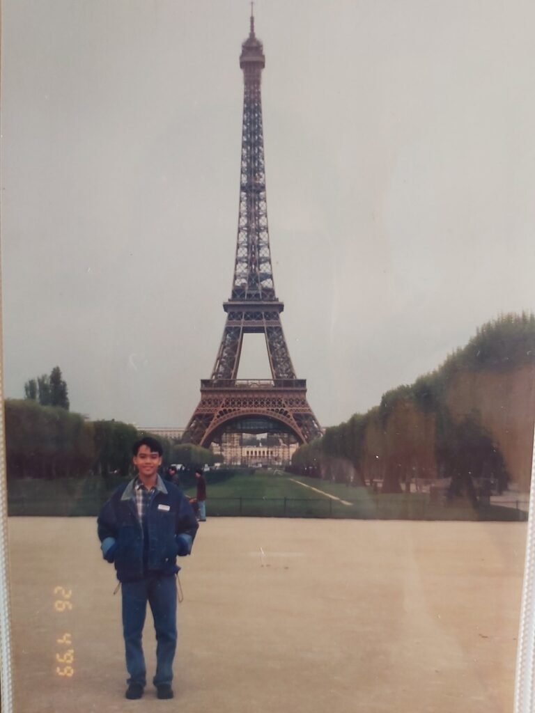 Benedict as a child at the Eiffel Tower