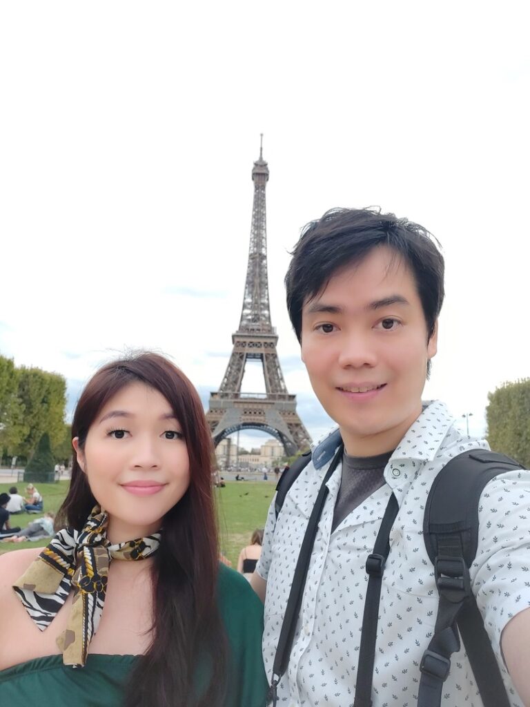 Benedict and his wife at the Eiffel Tower