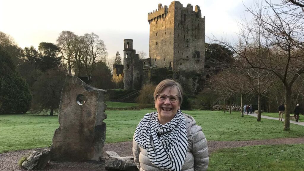 Susan posing in front of Blarney Castle