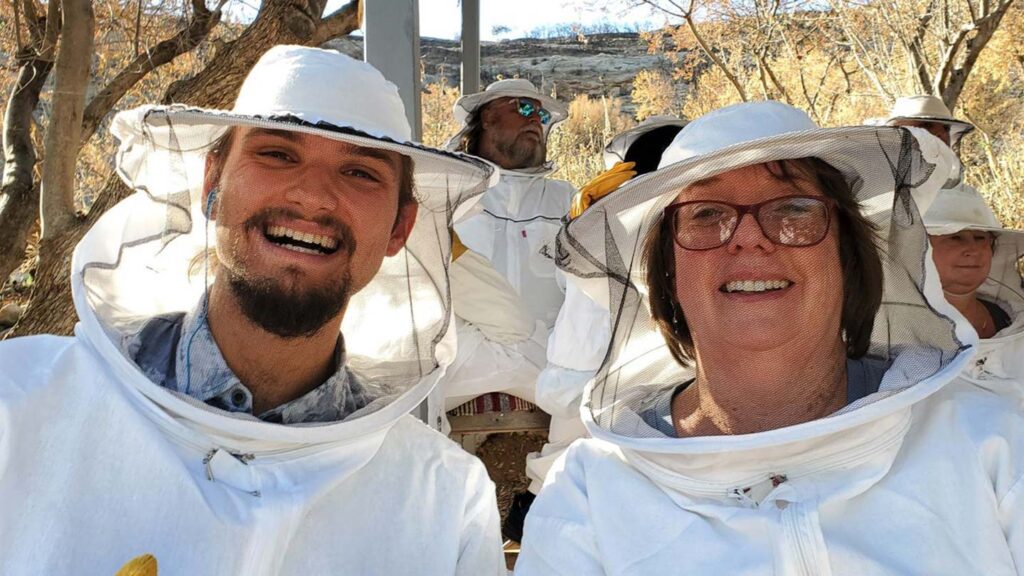Valerie in her beekeeper suit on tour in Greece