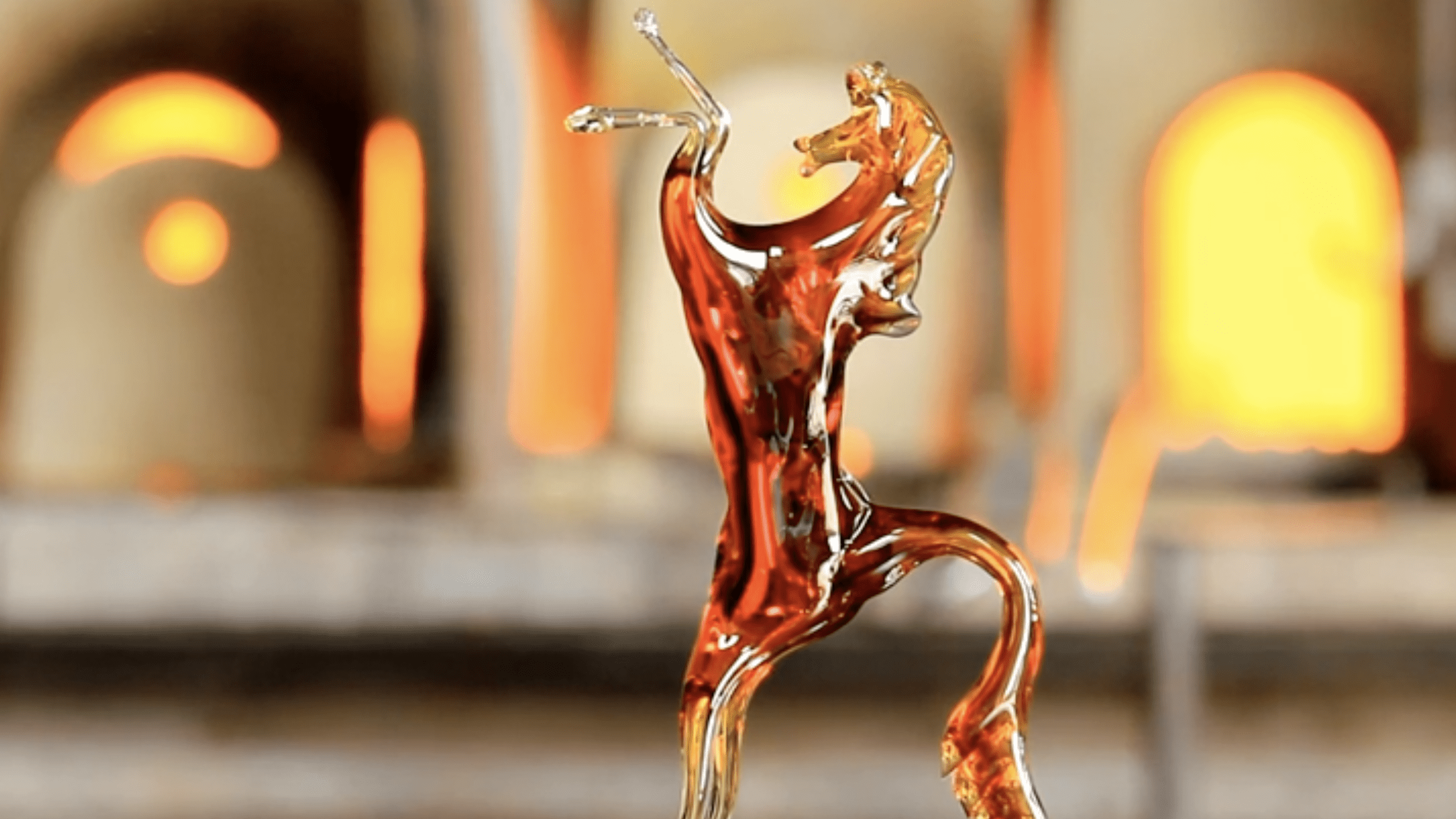 Close-up of a glass horse standing up tall