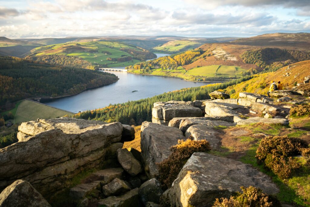 Bathed in sunlight is Bamford Edge, overlooking the Ladybower Reservoir in England's Peak District.