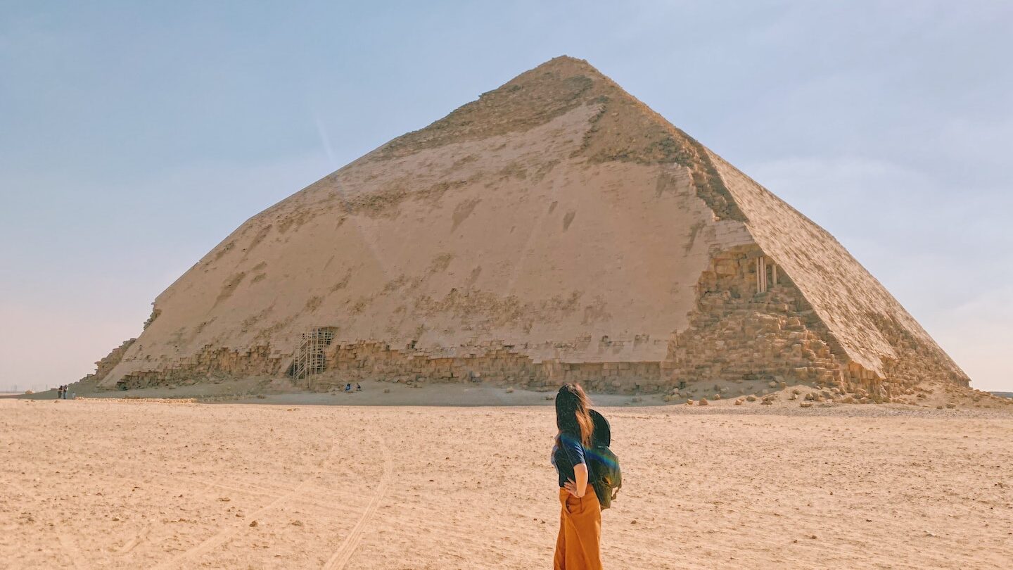 Woman standing in front of Pyramid in Egypt