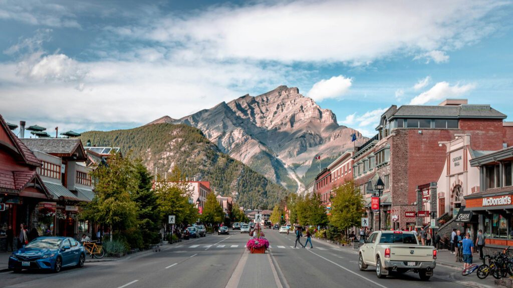 View of the main street in Banff, looking towards a mountain peak